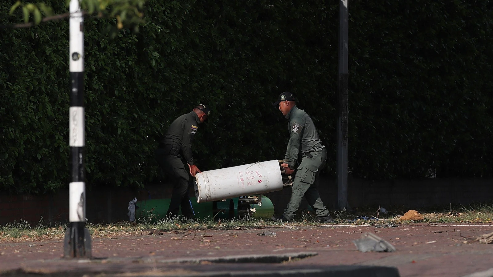 Bomb and attack on helicopter in Colombia kill at least 17, including police officers