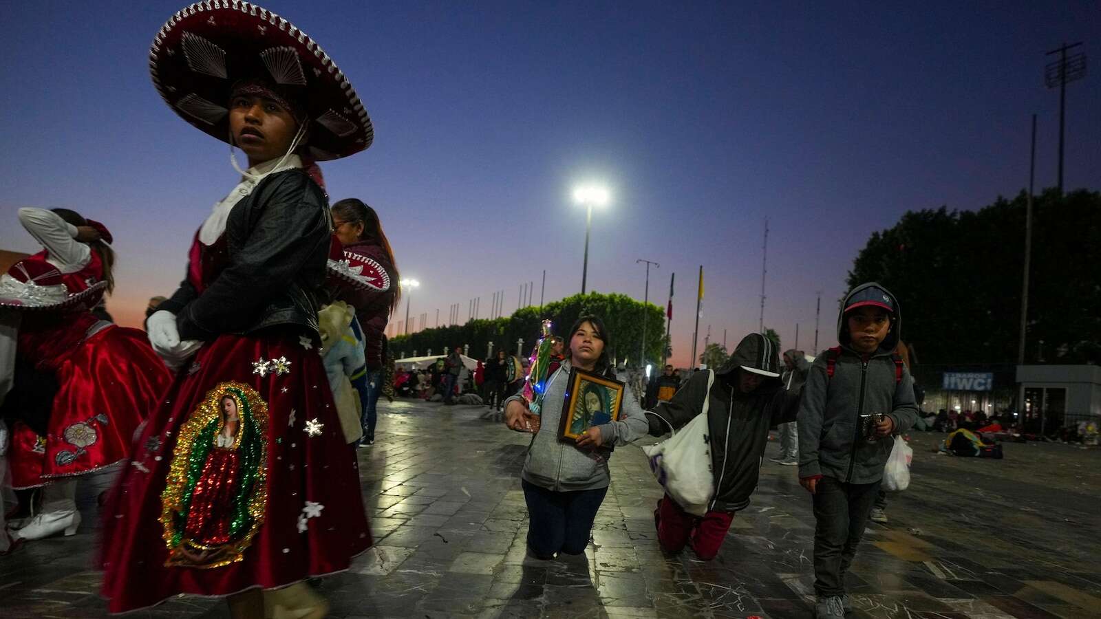 Millions mark Mexico's Virgin of Guadalupe Day but calls for a truce in drug violence go unheeded