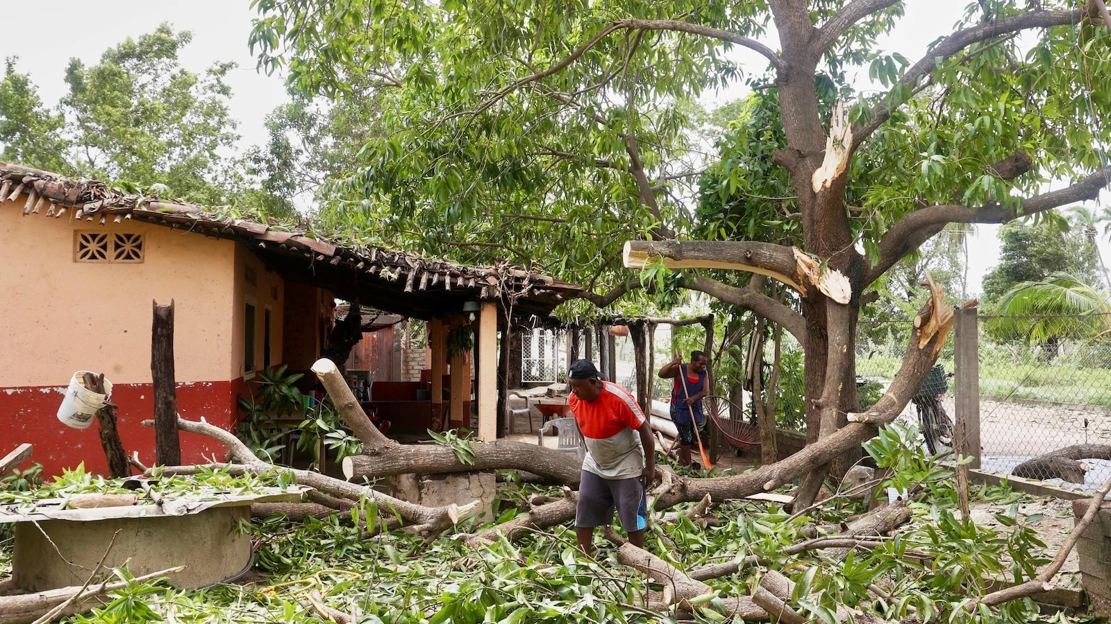 Mexico assesses damage from Hurricane Erick as rising rivers leave at least 1 dead