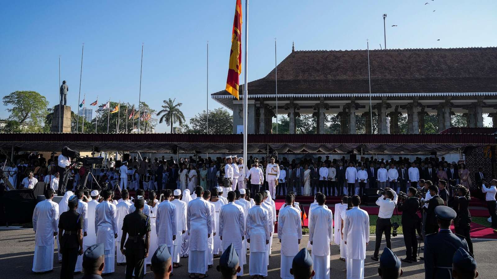 Debt-stricken Sri Lanka marks independence day as new president pledges to rebuild the country