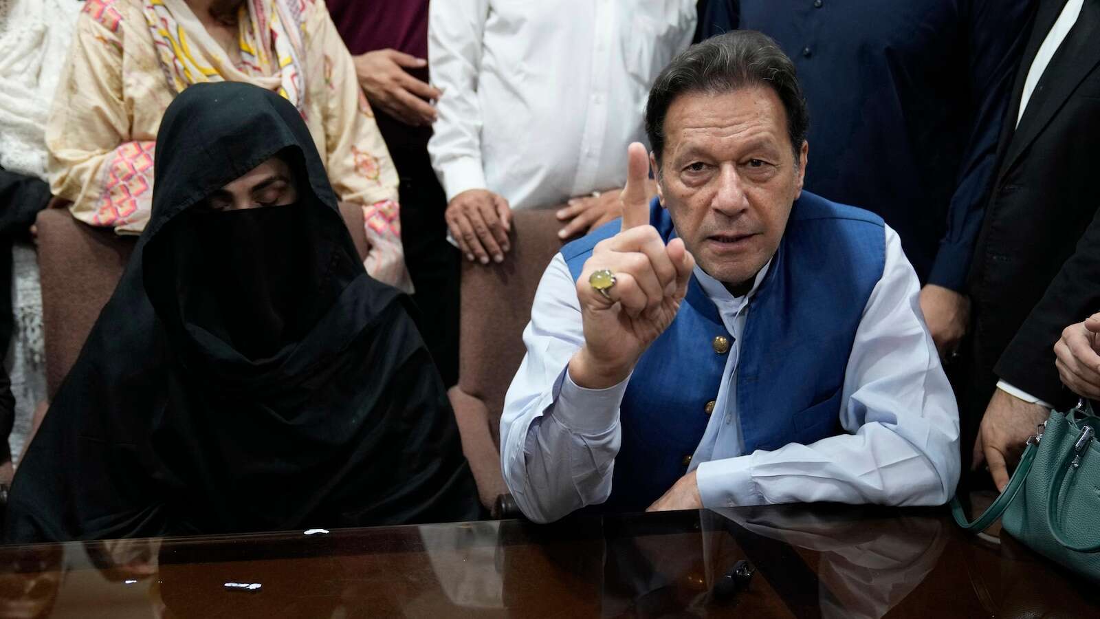 A Pakistani court indicts imprisoned former PM Imran Khan and his wife for corruption