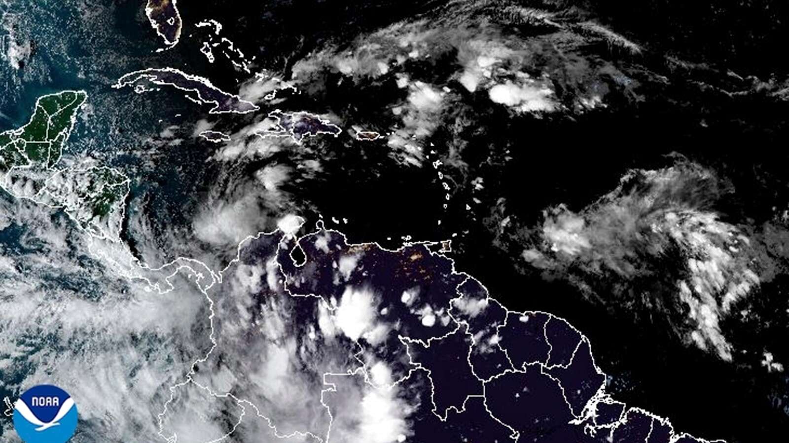 Tropical Storm Rafael spins toward the Cayman Islands as Cuba prepares for hurricane hit