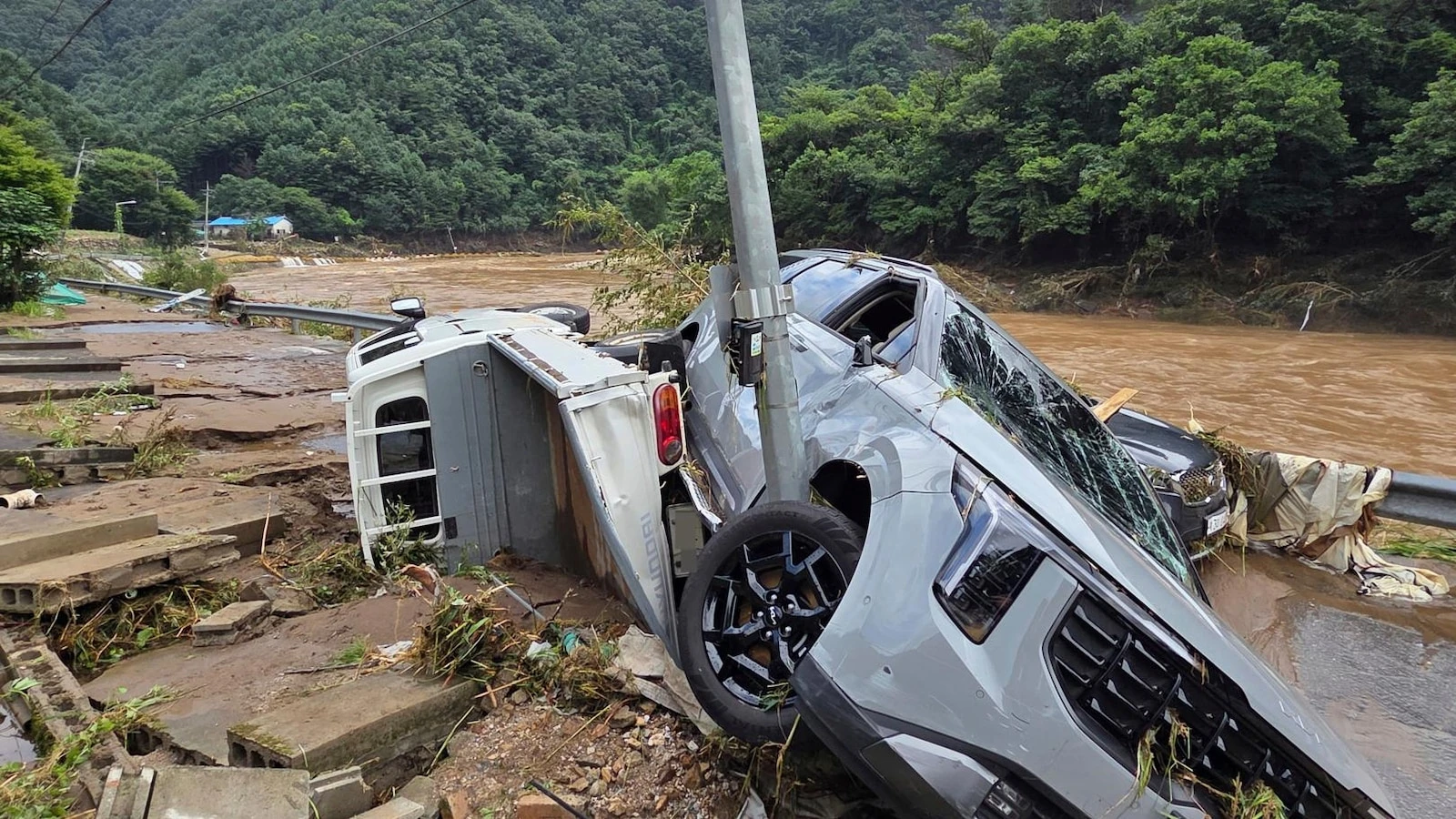 Heavy rains in South Korea leave at least 14 dead and 12 others missing