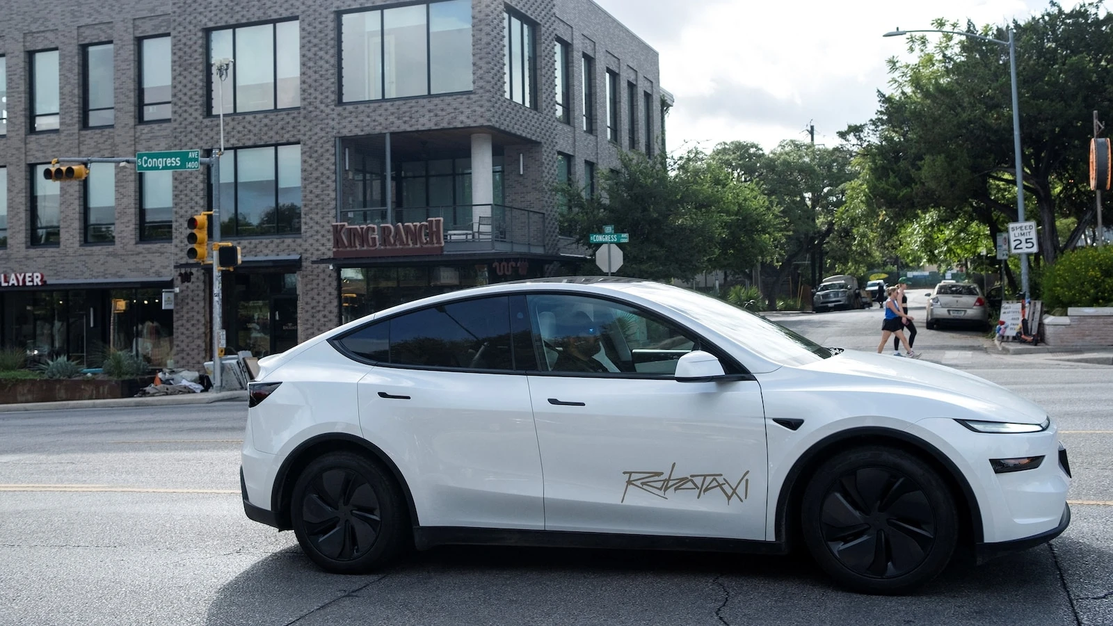 How is Tesla's robotaxi rollout going? Experts weigh in