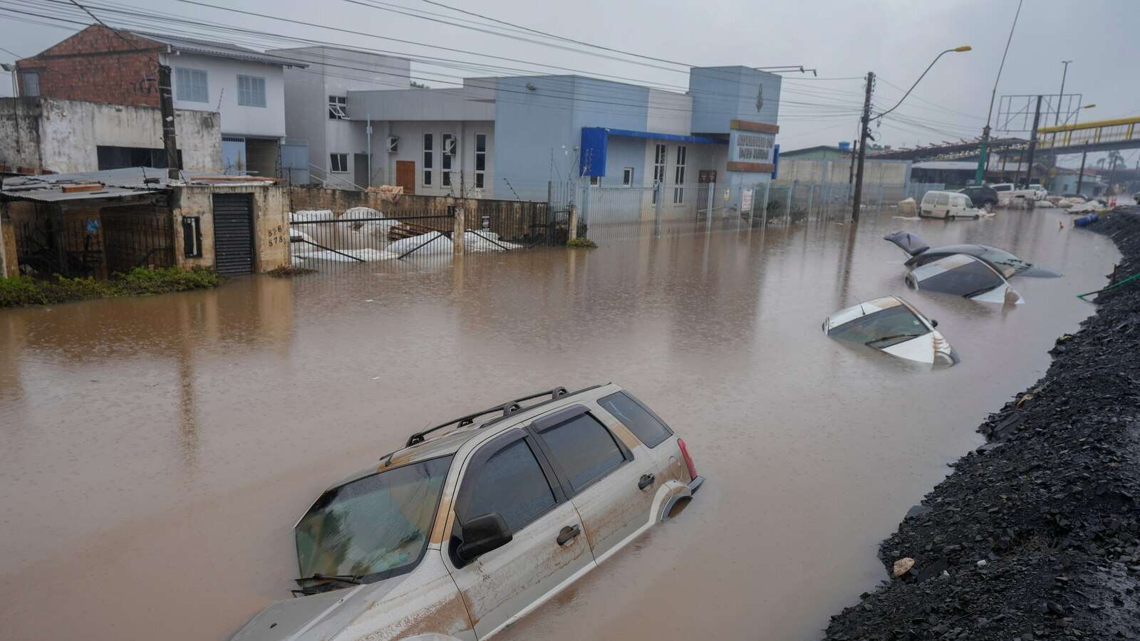 Brazil's flooded south sees first death from disease, as experts warn of coming surge in fatalities