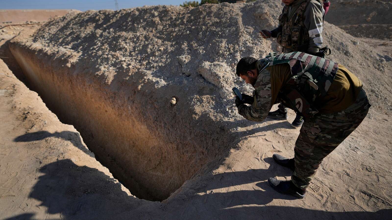 After Assad's fall, the task of unearthing the dead from Syria's mass graves is just beginning