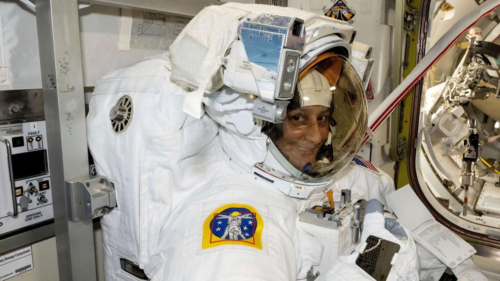 NASA's stuck astronaut steps out on a spacewalk after 7 months in orbit