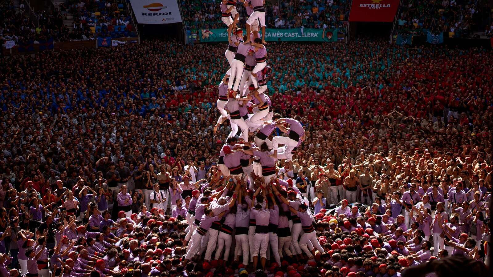 AP PHOTOS: Human towers rise skyward in Spain's Catalonia as part of cultural pride