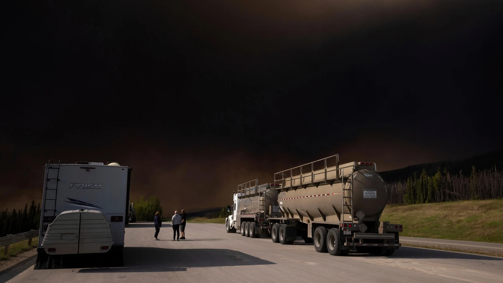 Thousands evacuated in 3 provinces as Canadian wildfires threaten air quality into some US states