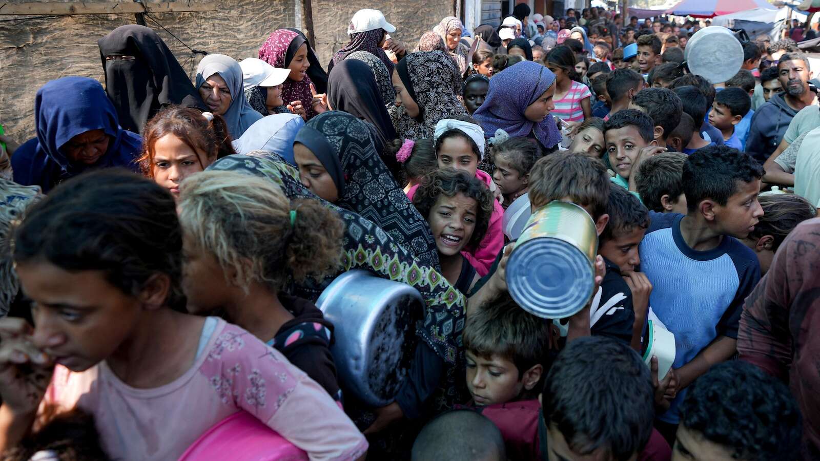 Hungry Palestinians in north Gaza search for food, sealed off from aid for a month by Israeli siege