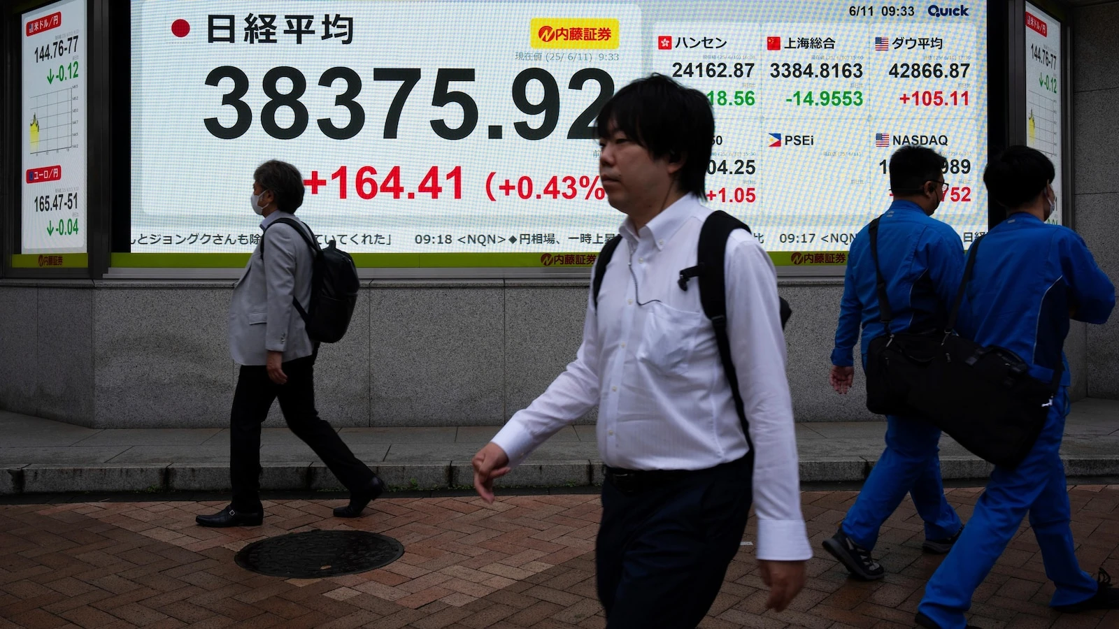 Asian shares climb after China and the US say they have a framework for seeking a trade deal