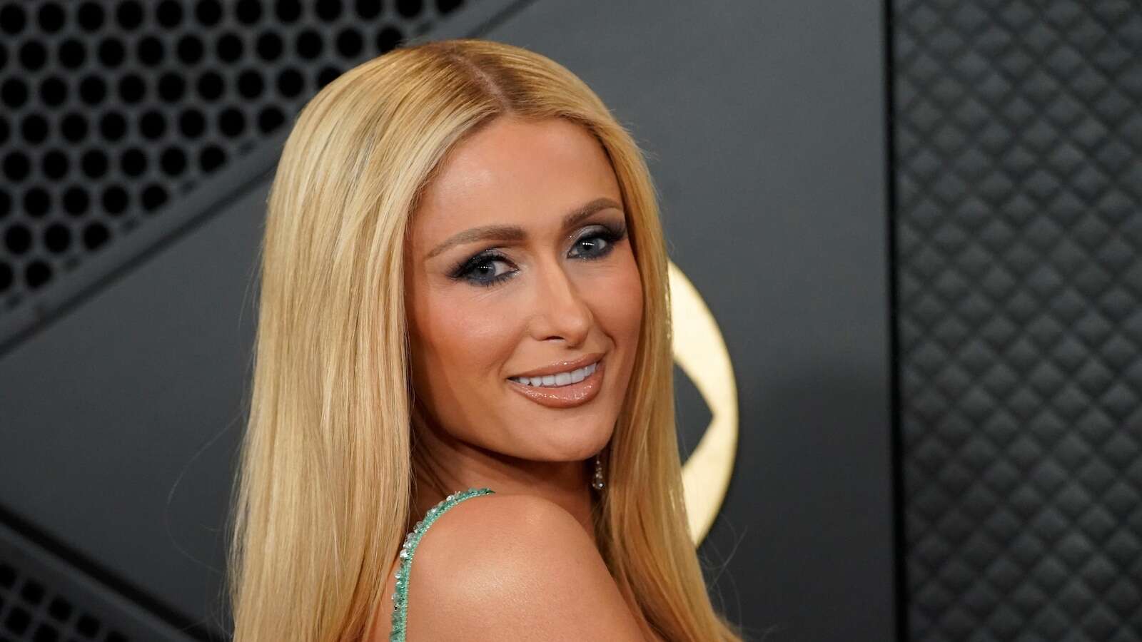 Paris Hilton waited 18 years to drop a new album. On 'Infinite Icon,' she's here to 'save pop music'