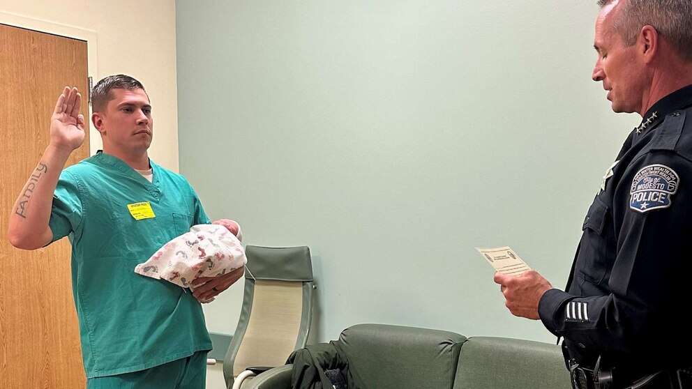 Police officer gets sworn in with newborn son at hospitalTrent Kersey said he is 