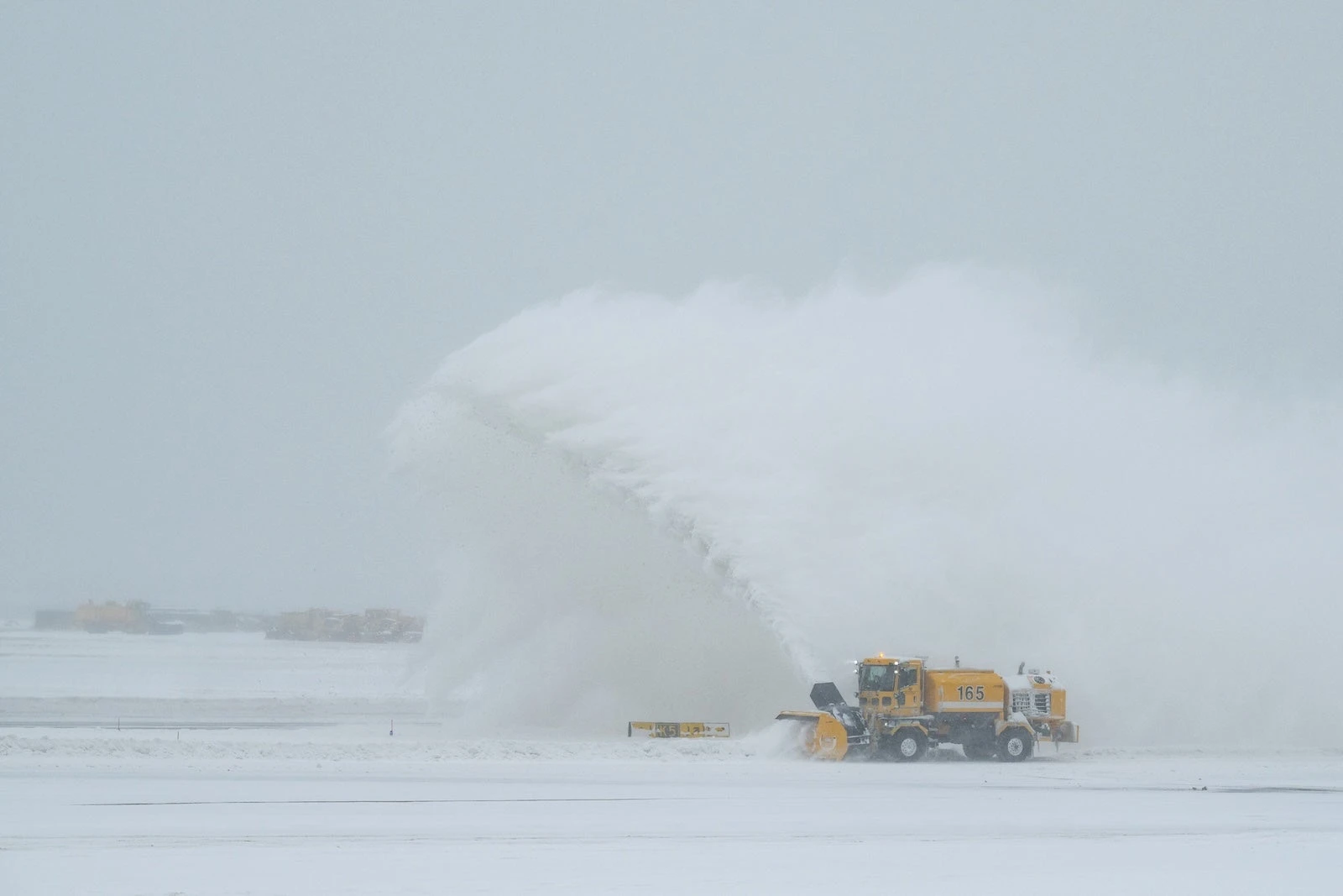 Mass Saturday flight cancellations begin as another winter storm takes aim at East Coast