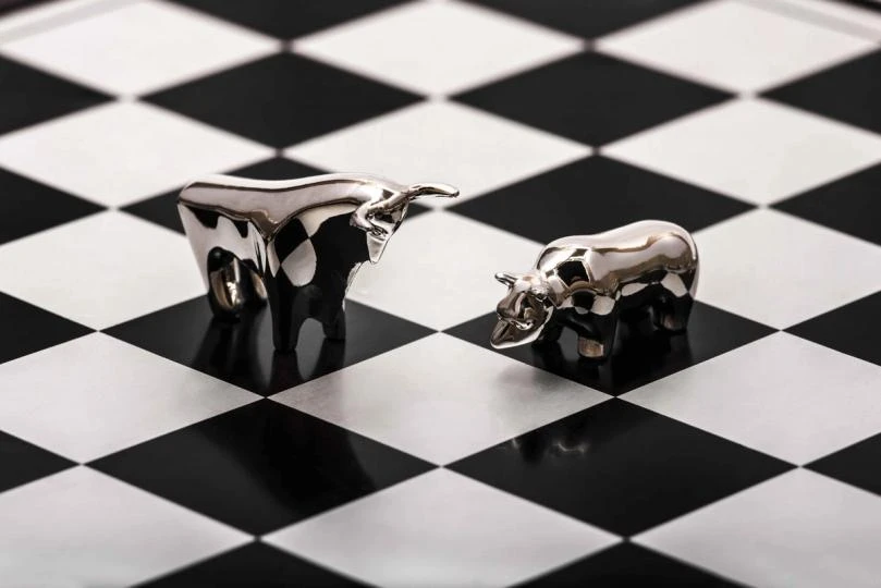 Bitcoin slide to $70,000 as stocks pause and Strategy's BTC sale weighs on crypto