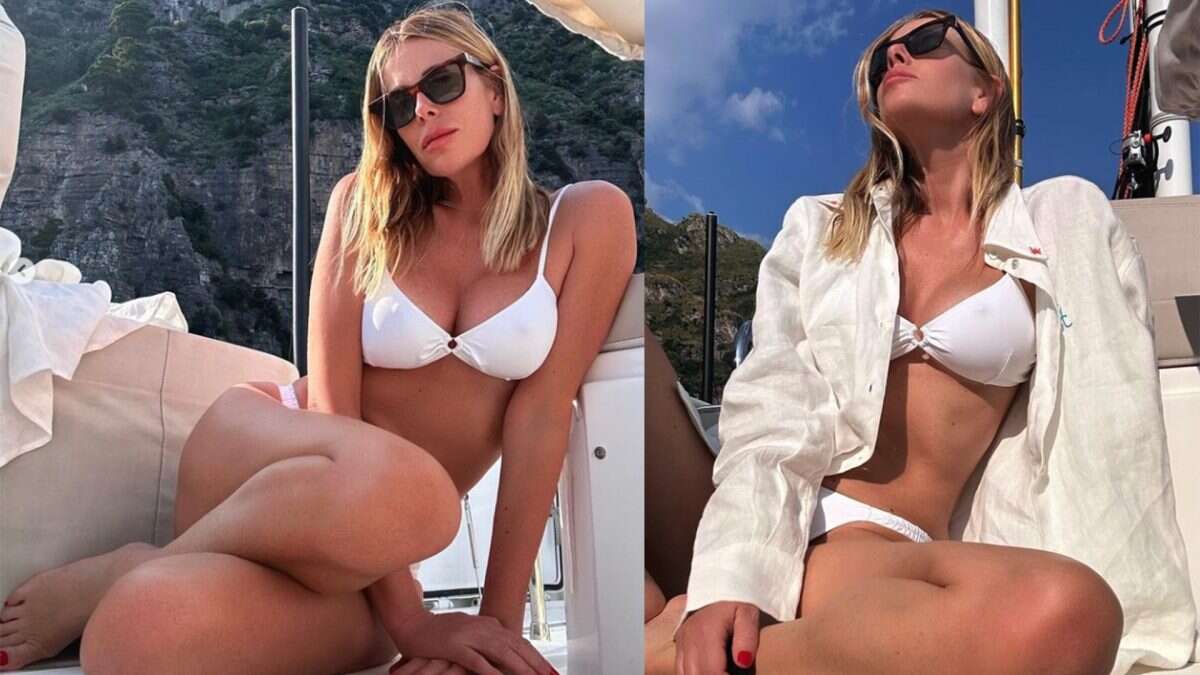 Alessia Marcuzzi col look balneare total white: al bikini bianco abbina la camicia