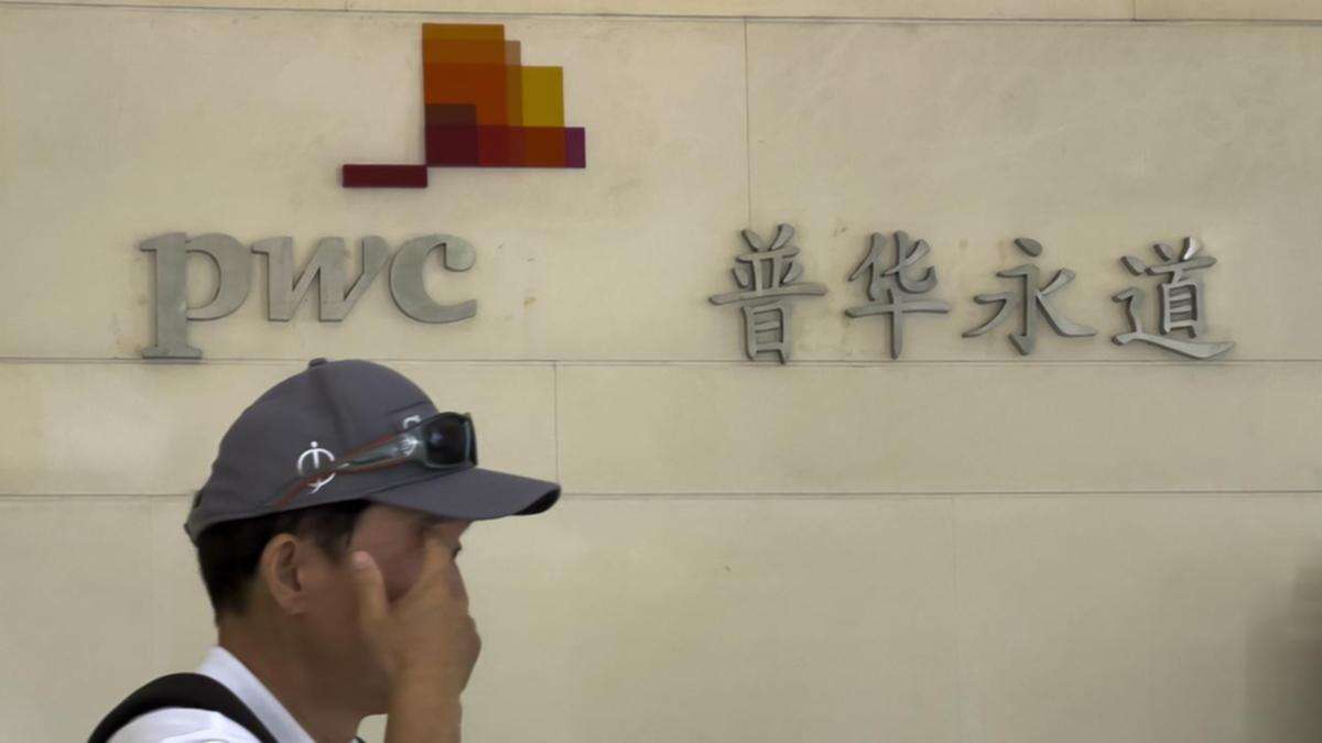 China bans PwC for six months over Evergrande audit