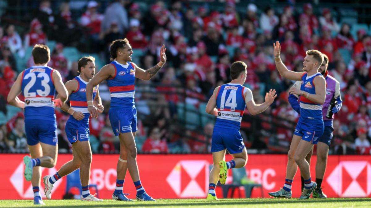 Bulldogs stun Swans to clinch AFL top eight spot