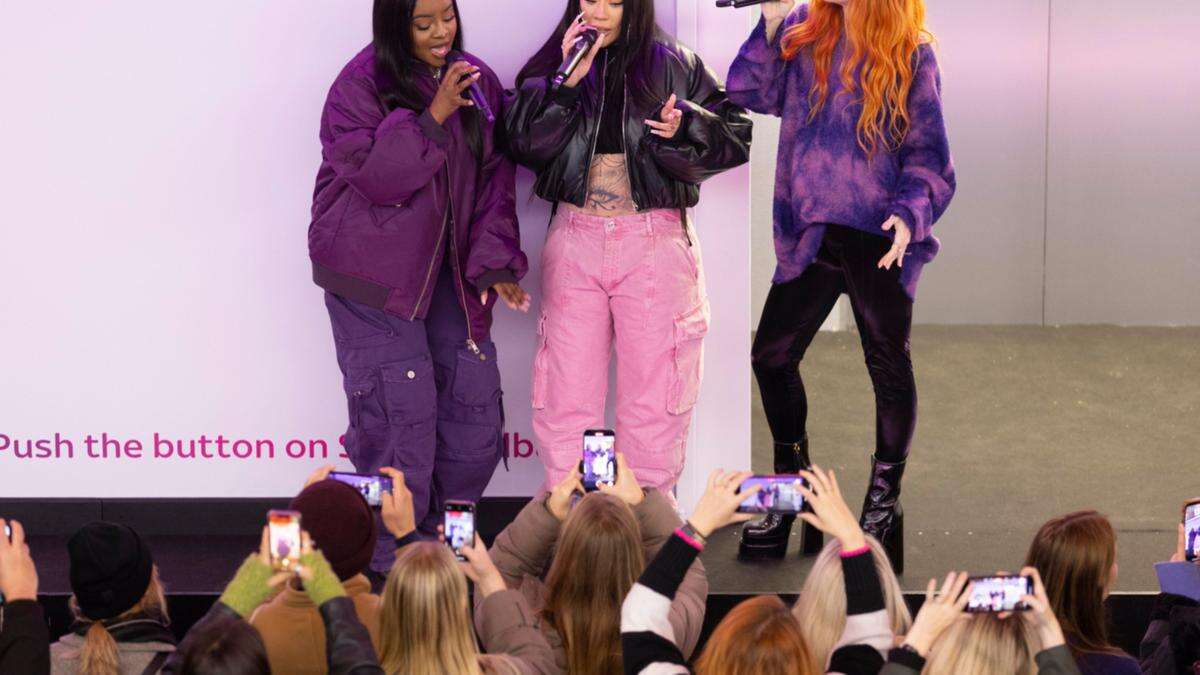 Sugababes surprise commuters with performance at London King's Cross station