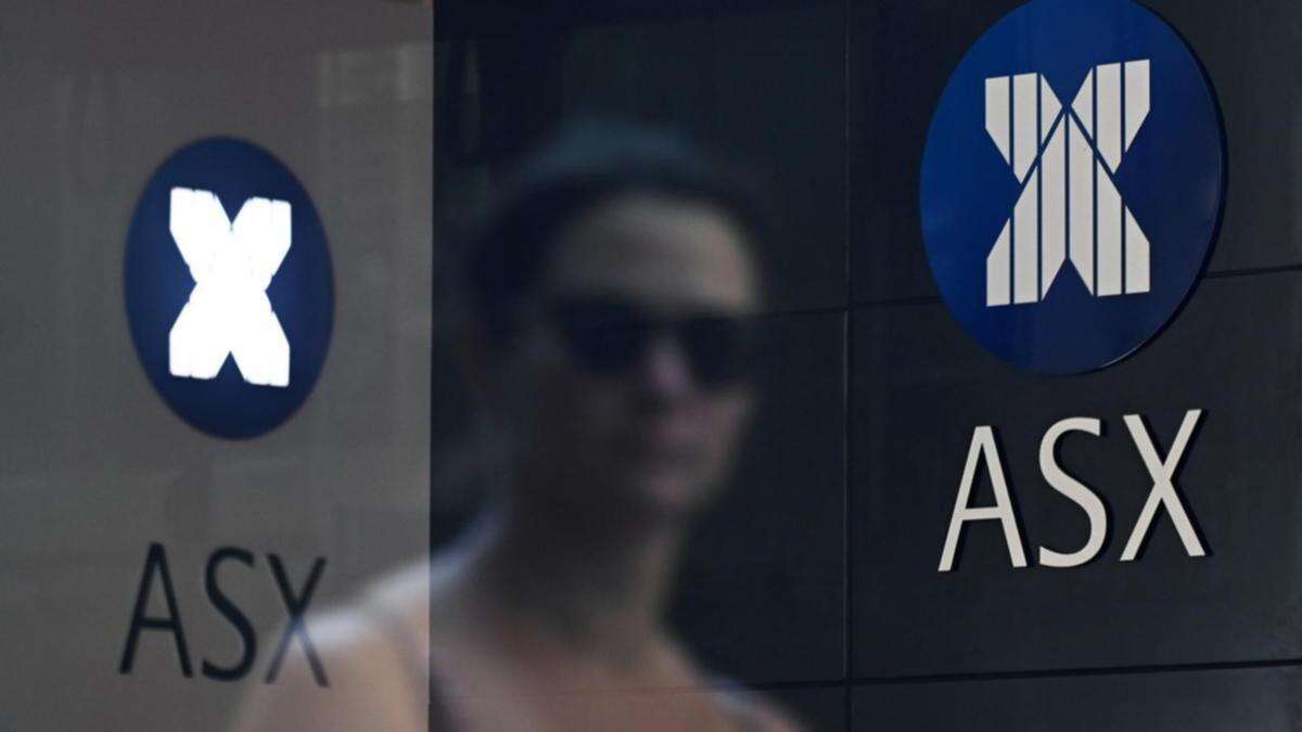 Australian shares slipping as banks, gold drags