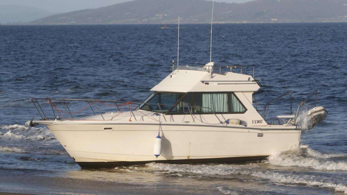 Mystery boat washes ashore, man missing