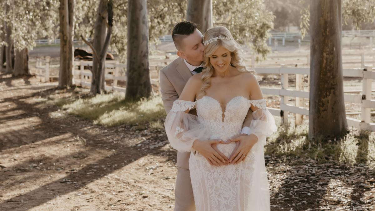 Bride and groom don NIKE SNEAKERS for their wedding