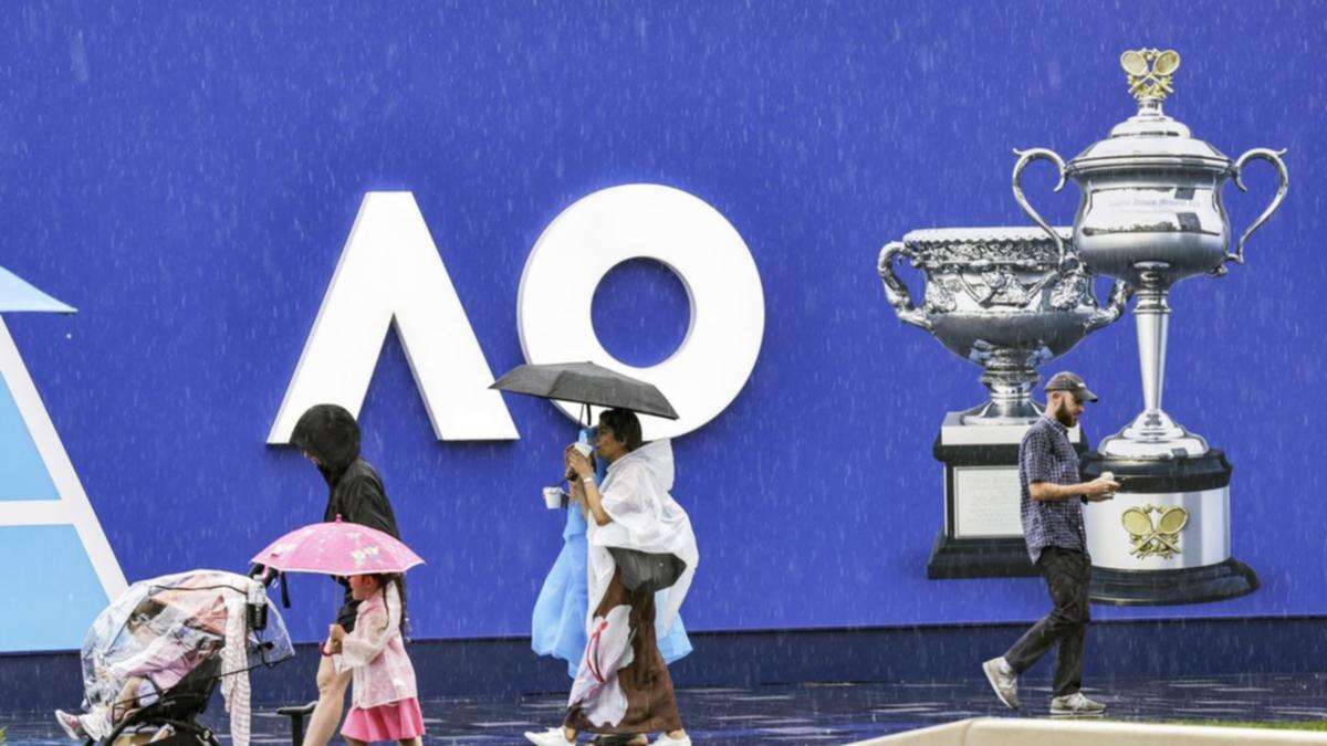 Wild weather slams tennis, as fans brace for more rain