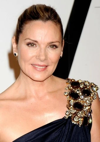Kim Cattrall has a 'blast' with 'fun playmate' Russell Thomas