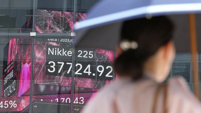 Asian stocks up as Trump calls for Tehran evacuation