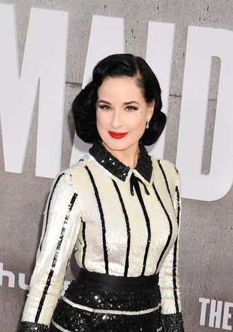 Dita Von Teese wouldn't want to 'expose' some people in her memoir