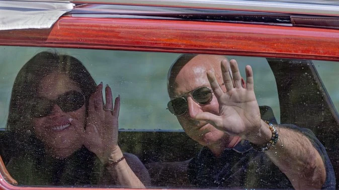 Bezos and Sanchez arrive in Venice for wedding party