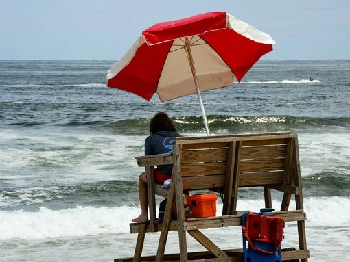 ‘Protruding by a foot’: Lifeguard impaled by beach umbrella