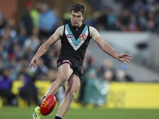 Port ace to put footy over family in long-term decision