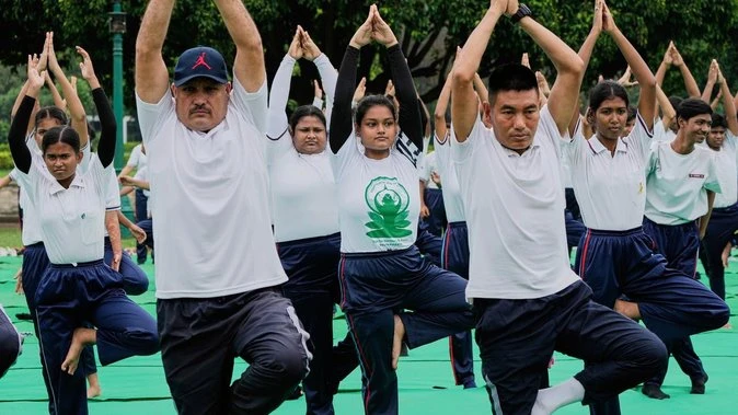 Home stretch: Indians strike a pose for world yoga day