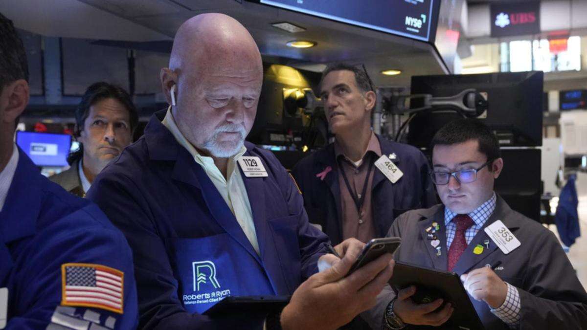 Wall Street mixed after soft US job openings report