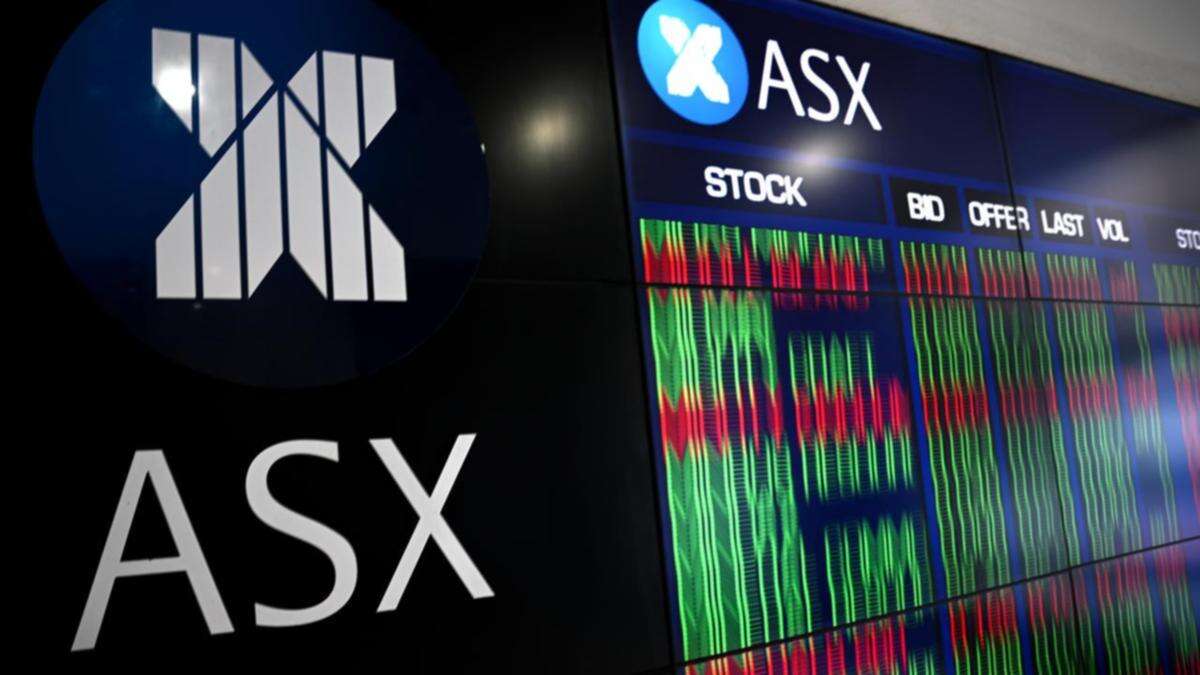 ASX slips but hovers just below all-time high at midday