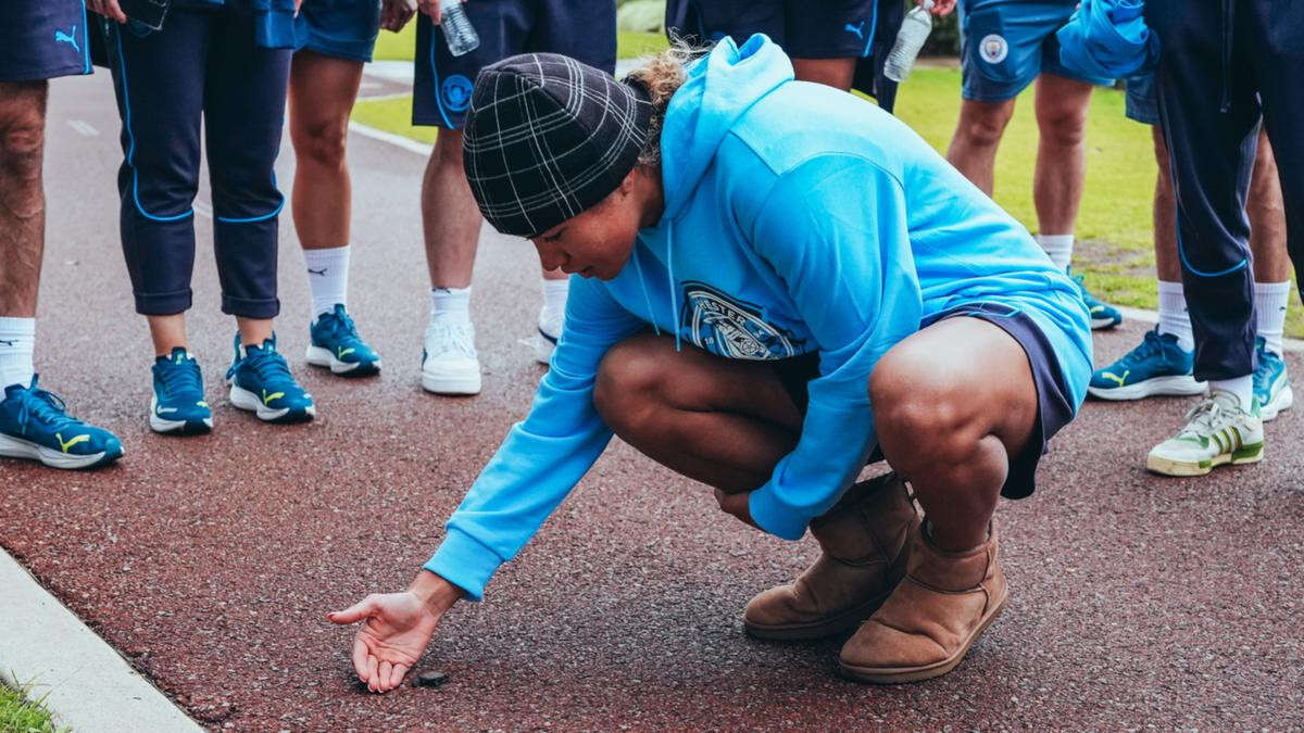 Soccer superstar gives baby tortoise a helping hand in Perth