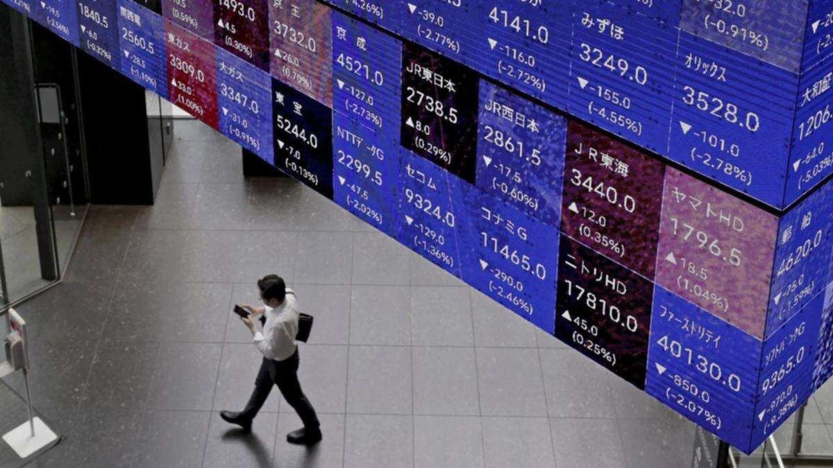 Asian shares track lower as Nvidia disappoints