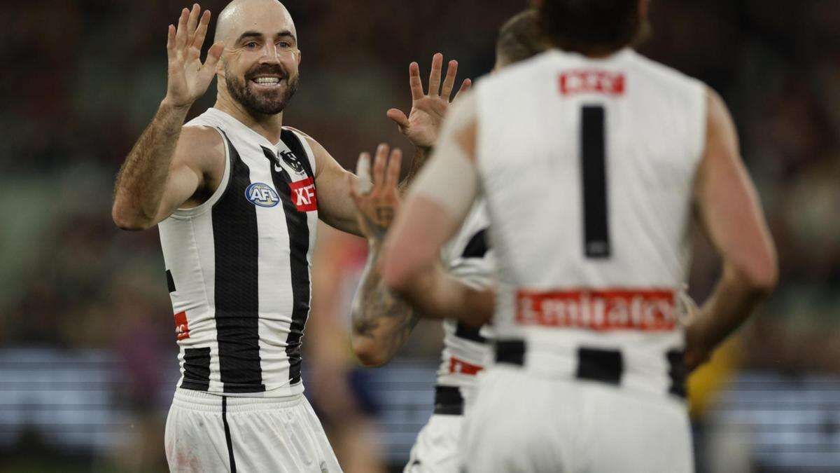 Pies sign off on premiership defence in style