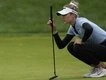 Korda shoots 66 to keep bid for golfing history alive