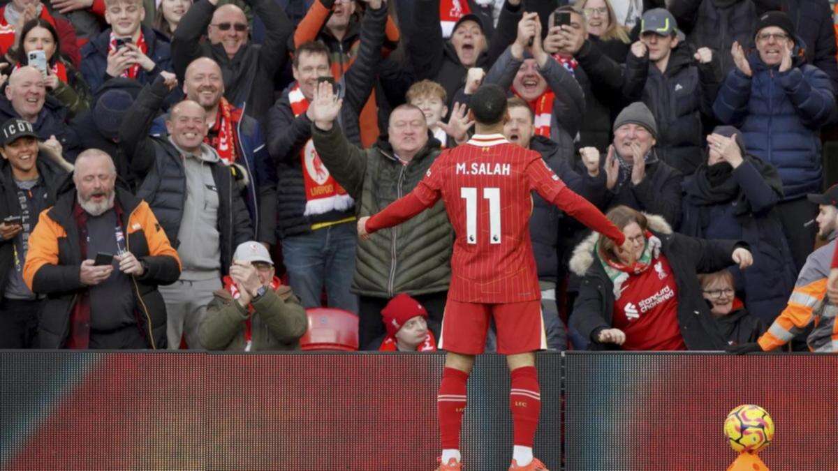 Salah's 100th Anfield league goal as Liverpool march on