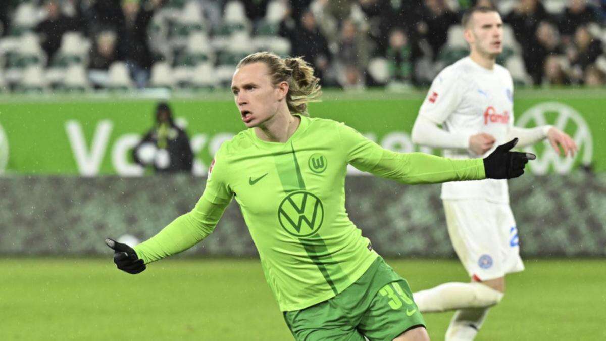 Kiel hit back in roller-coaster draw at Wolfsburg