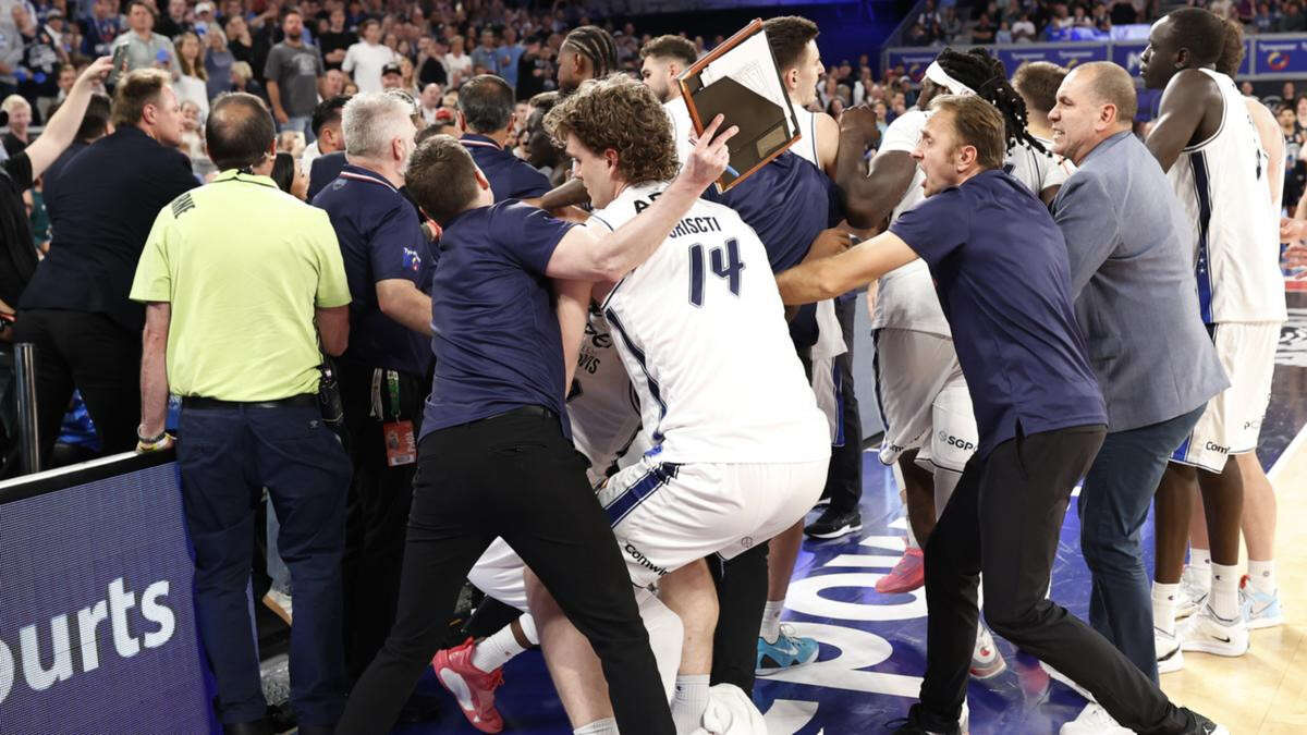 Fans clash with Adelaide 36ers players during NBL chaos