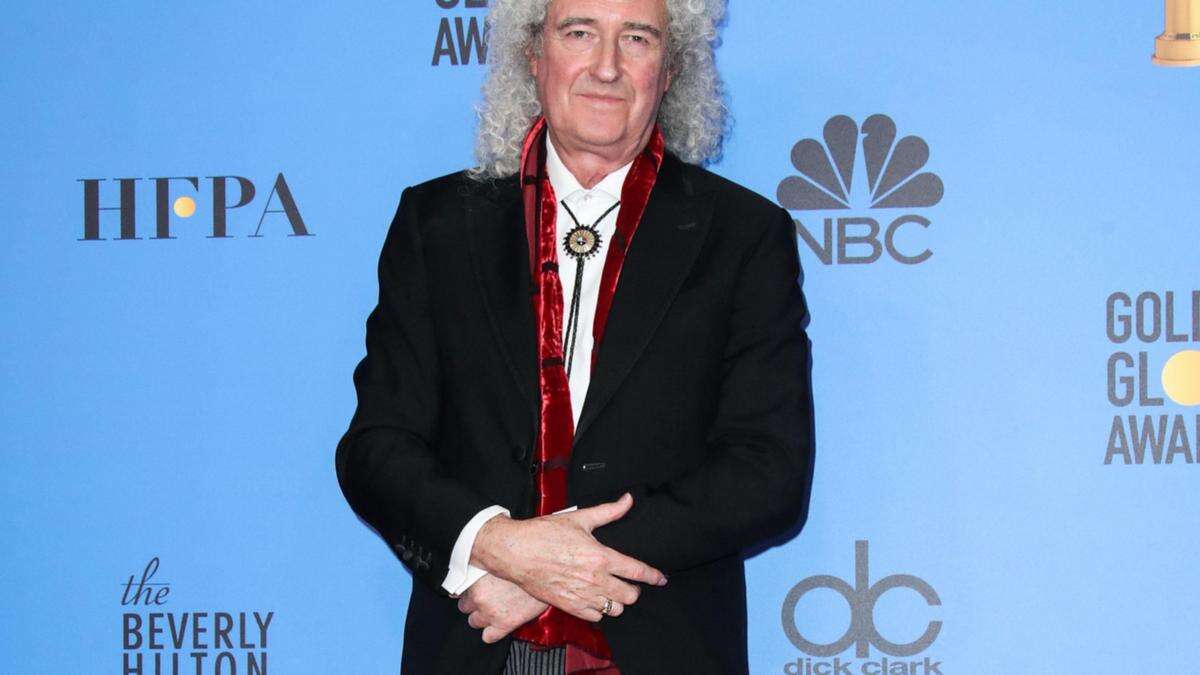 Brian May performed in pyjamas at a furniture shop