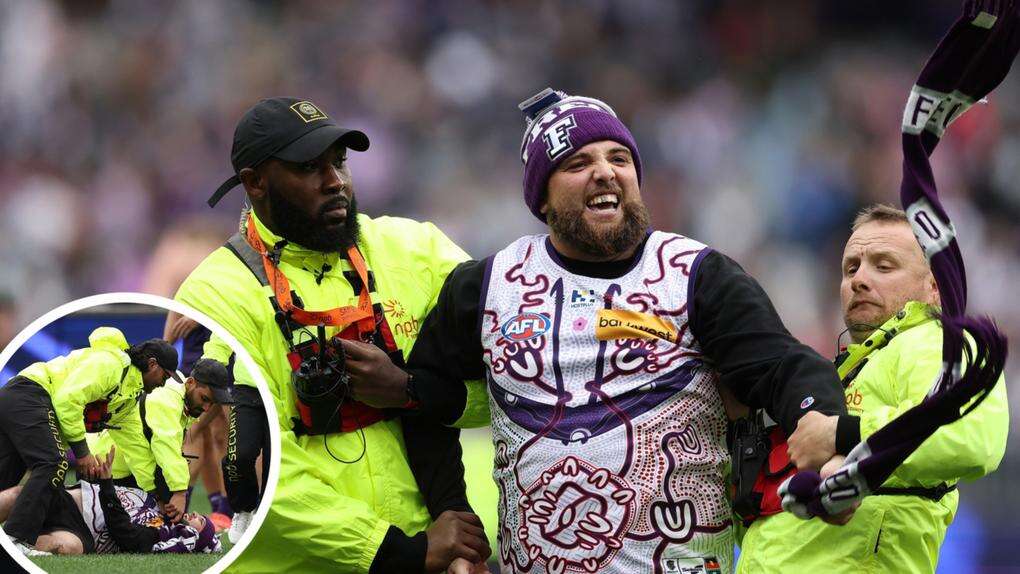 Cop that! Security give Optus Stadium invader the heave-ho