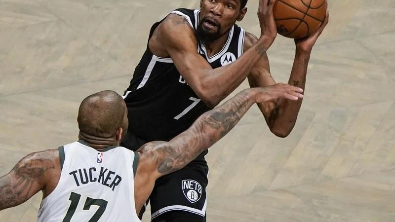 Bucks edge Nets in OT to advance in NBA