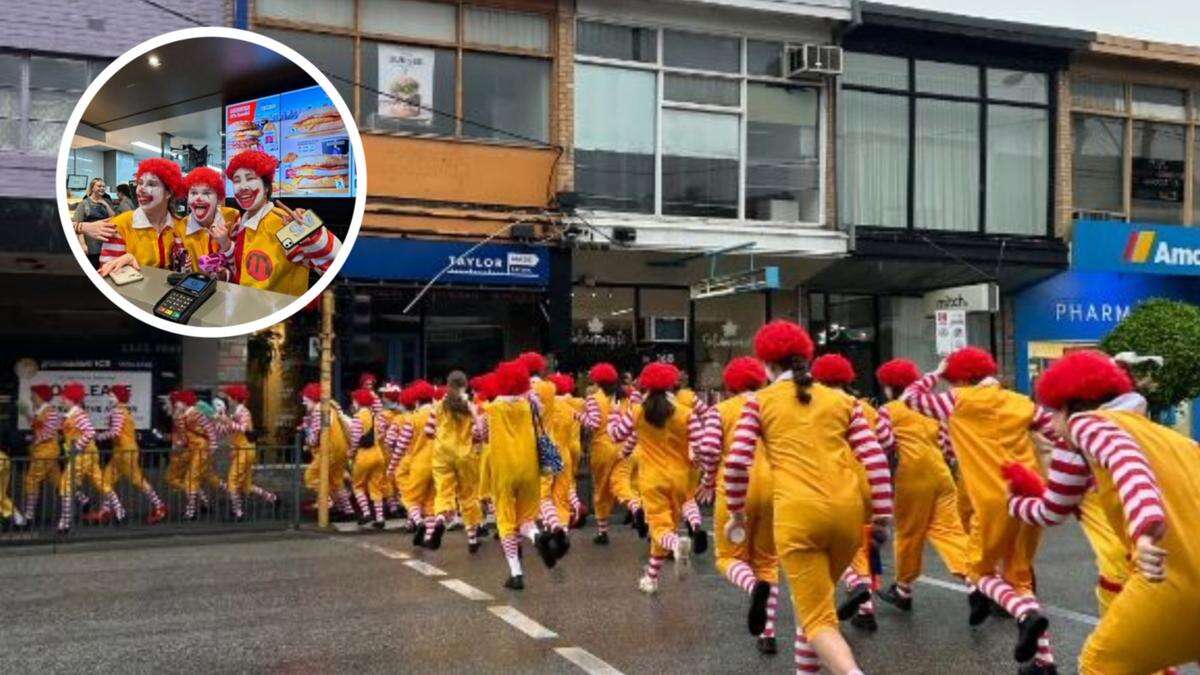 Maccas Madness! Sea of Ronald McDonalds storm restaurant