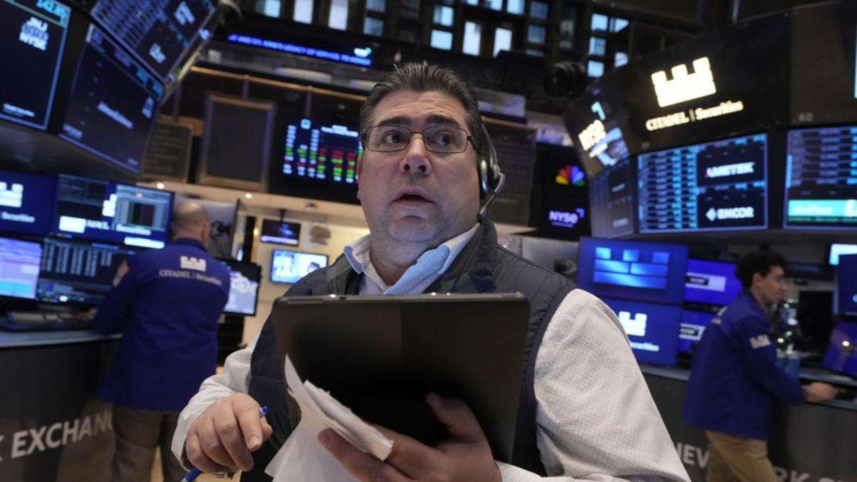 Wall Street soars after inflation data, bank earnings