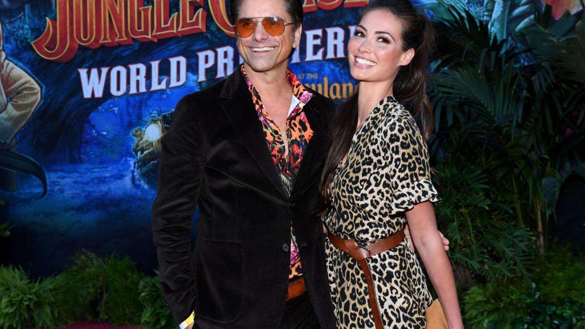 John Stamos praises wife's attempts to 'save the world'