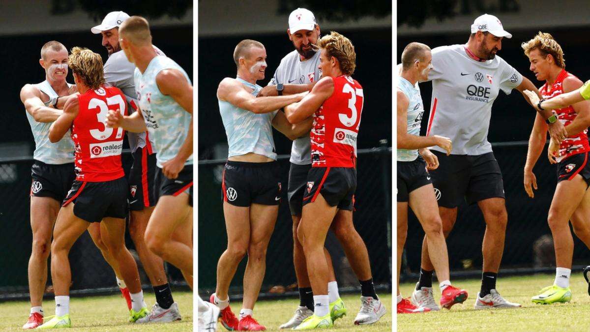 SEE THE PICS: Warner brothers scuffle at Swans training